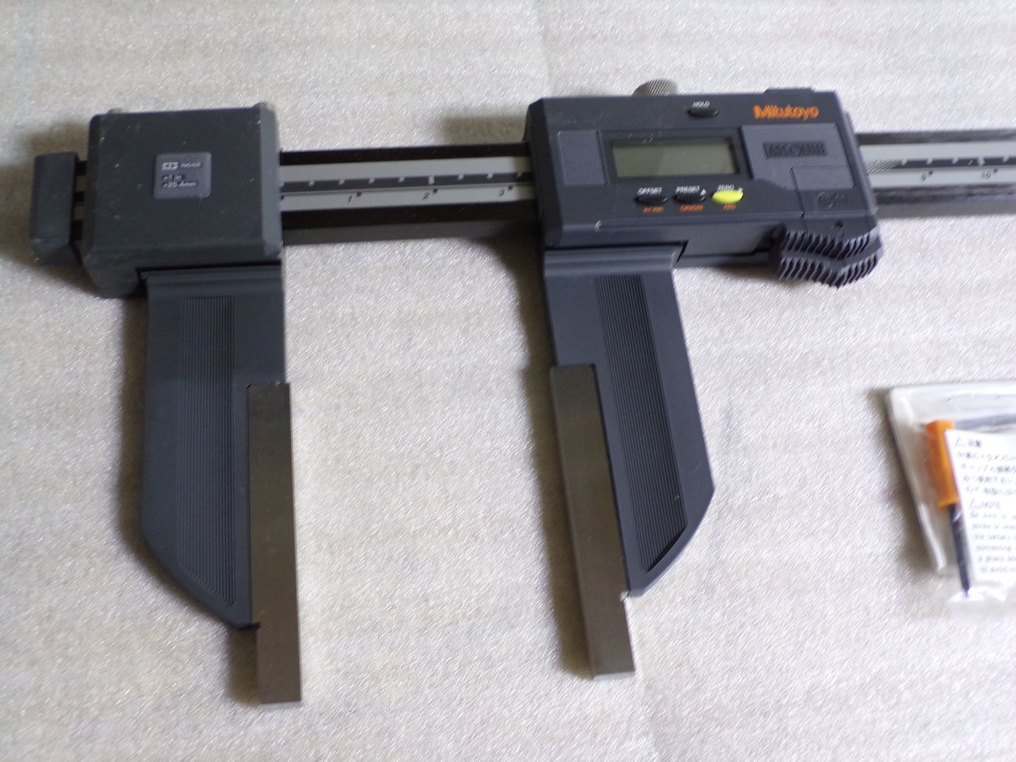 MITUTOYO Long Range Digital Caliper, Range 0 in to 40 in, 0 to 1,000 mm, IP Rating IP66, SPC Output Yes, Mfr. Model # 552-314-10 (CR00549-X02)