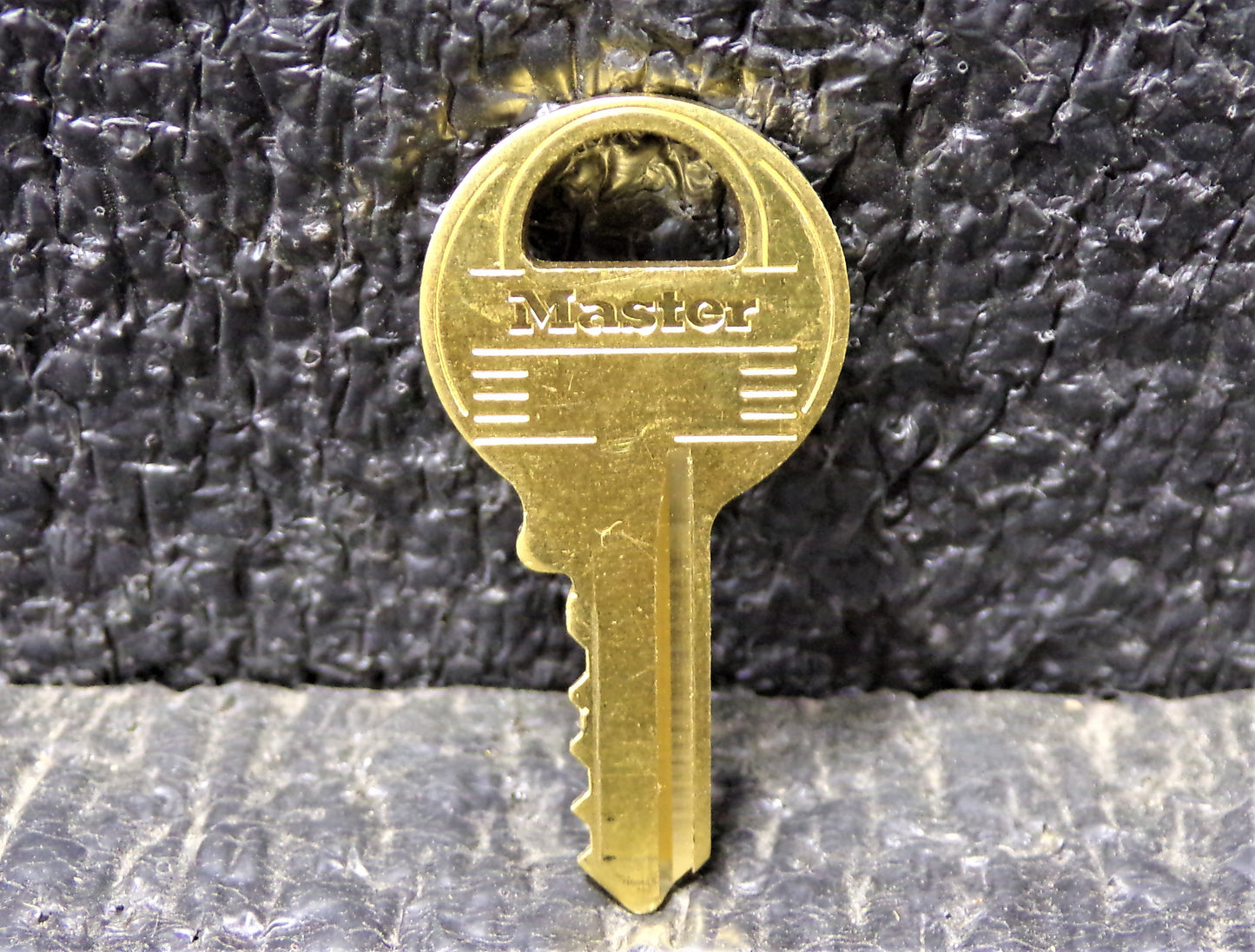 Master Lock Key E233 (CR00120-WTA15)